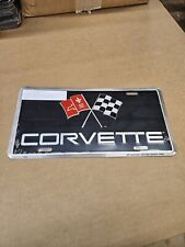 Corvette With Cross Flags Black Logo License Plate. New