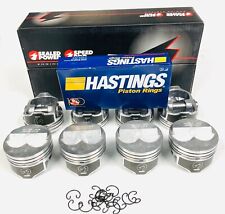 .275 Dome Coated Skirt Pistons Set Of 8 And Matching Moly Rings 350 Chevy.